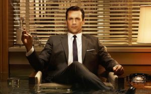 A man wearing a suit and tie