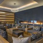 A living room filled with furniture and a large window
