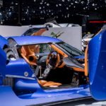 A blue car on display