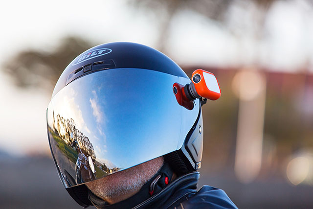 A close up of a person wearing a helmet