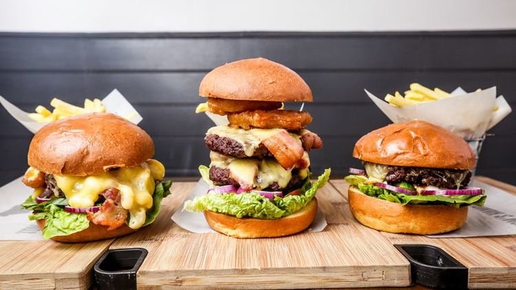 A sandwich sitting on top of a wooden table