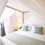 A bedroom with a bed in a hotel room