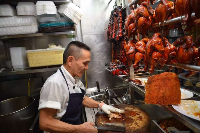 A man preparing food in a restaurant