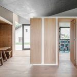 A large empty room with a wooden floor