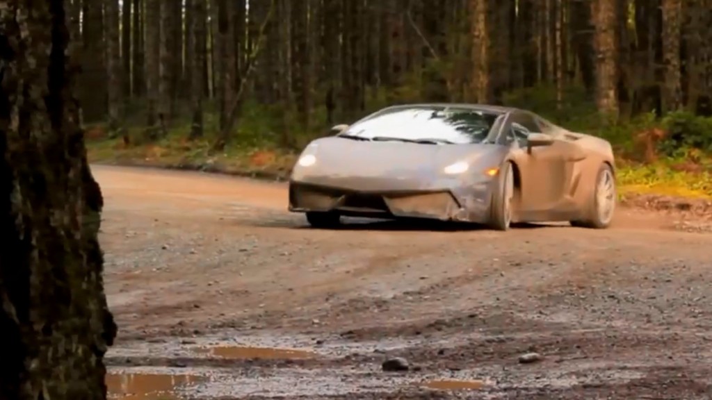 A car driving down a dirt road