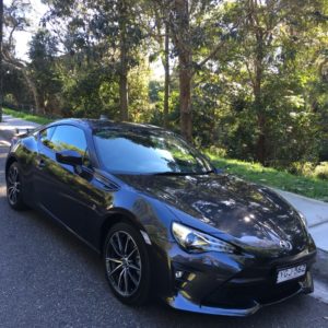 A car parked on the side of a road