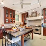 A kitchen with a dining room table