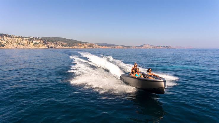 A small boat in a body of water