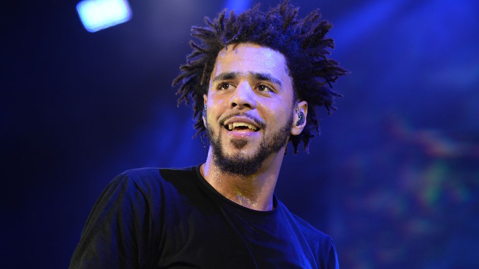 A man standing in front of a stage