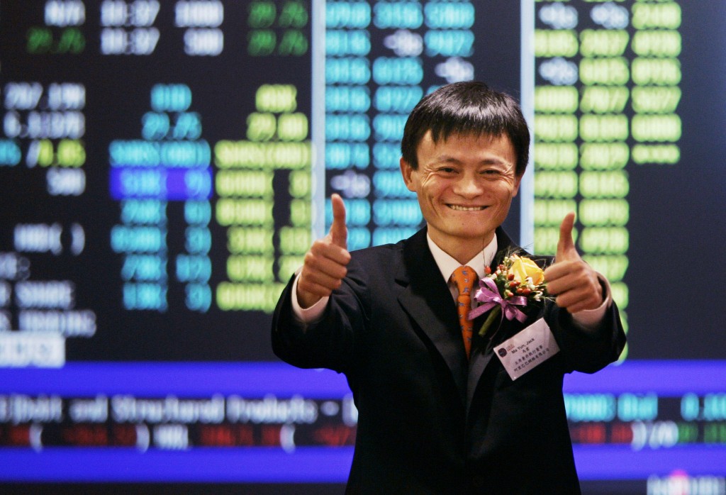 A screen shot of a man in a suit and tie