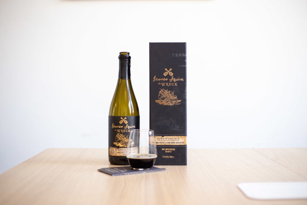 A bottle of wine on a table