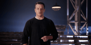 A man that is standing in the dark
