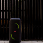 A green traffic light sitting on the side of the street