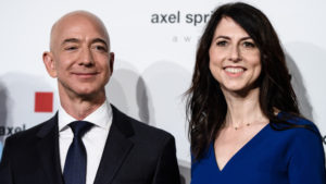 A man and woman posing for the camera