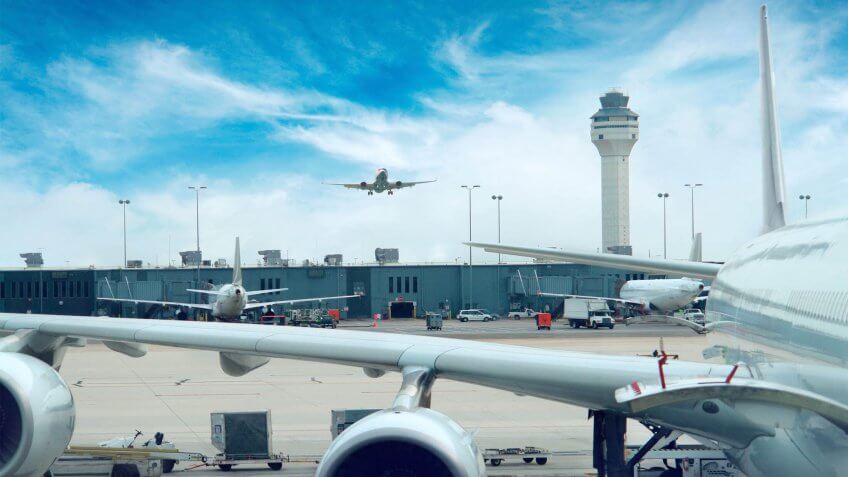 A large passenger jet sitting on top of a runway