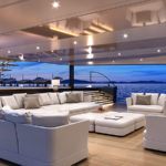 A room filled with furniture and a large screen