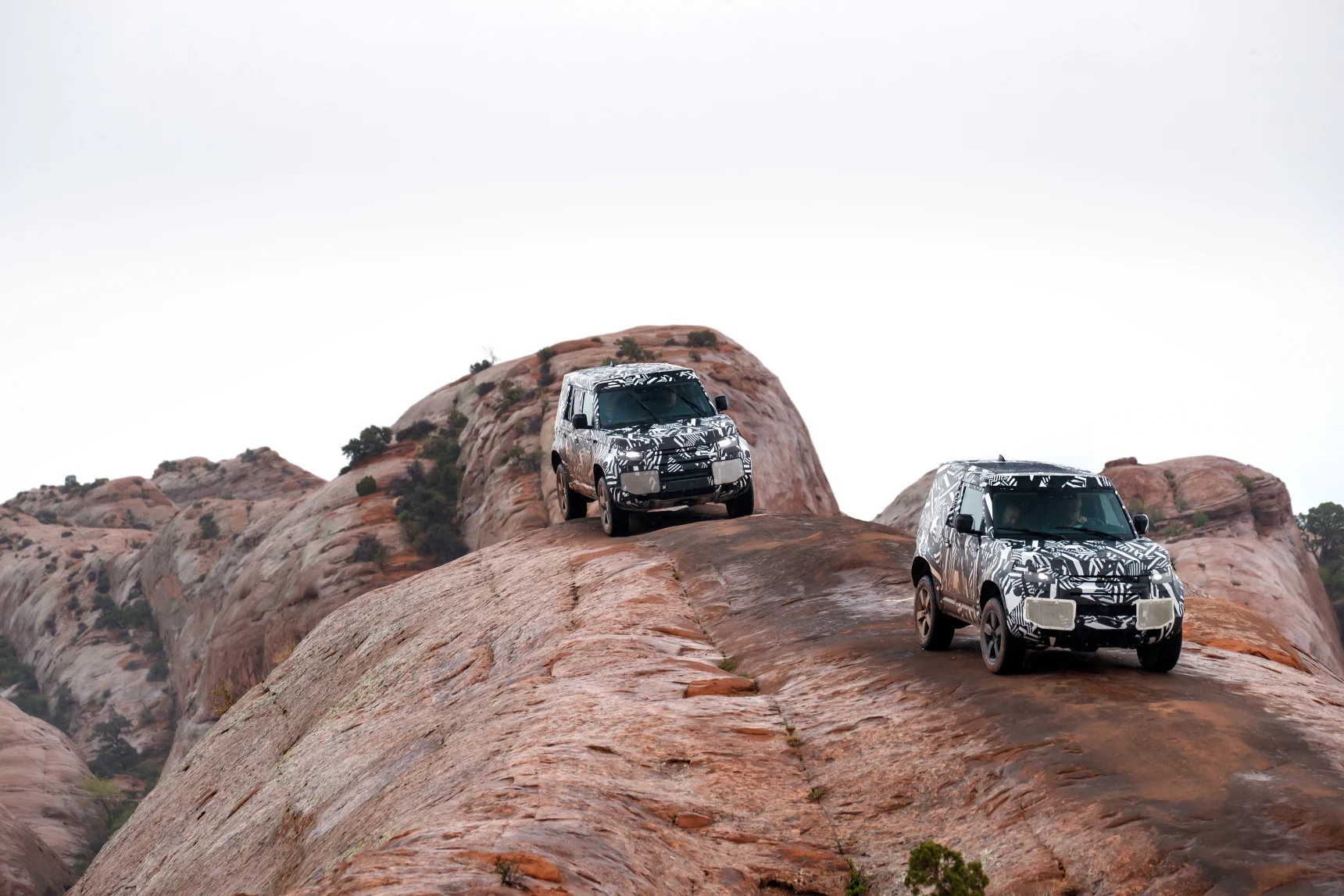 A car parked on the side of a mountain