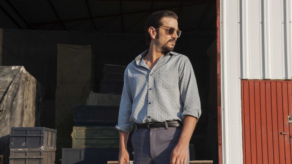 A man standing in front of a building