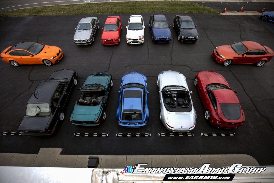 A bunch of luggage sitting on top of a car