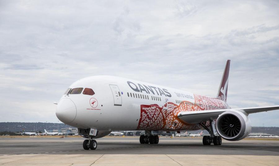 A large passenger jet sitting on top of a runway