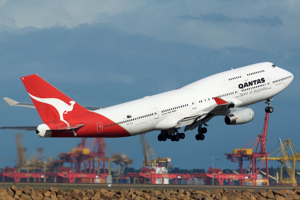 A large air plane on a cloudy day