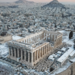 Acropolis Of Athens Coated In Rare Snowfall As Temperatures Plummet Across The Country
