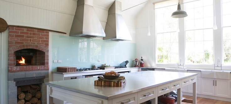 A kitchen with a sink and a window