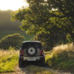 A car driving down a country road