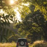 A car driving down a country road