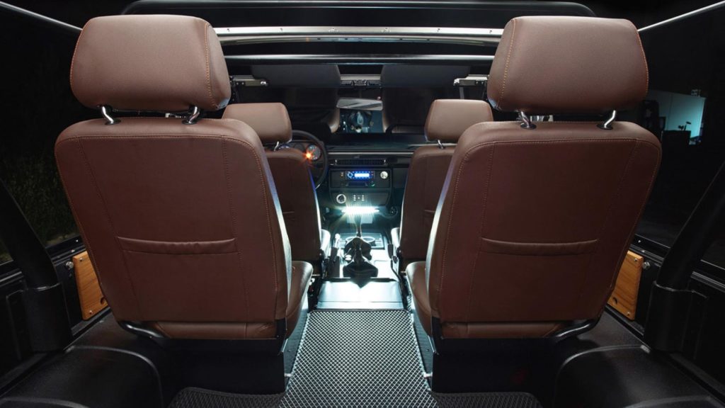 A chair sitting in front of a car