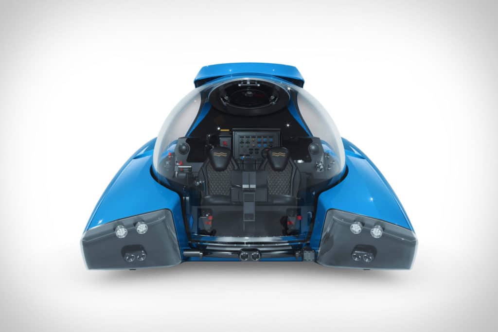 A blue toy car on display