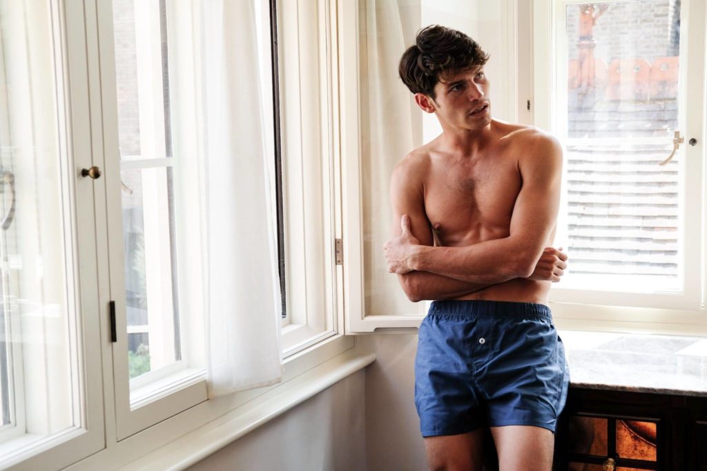 A man standing in front of a window