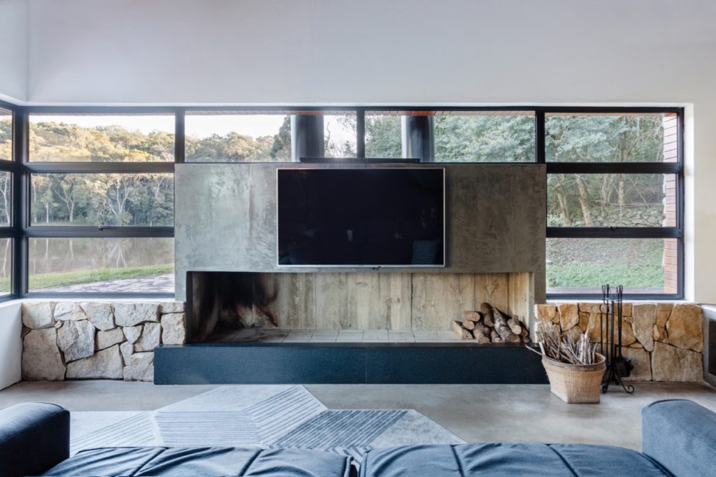 26 Year Old DJ Builds Sublime Lakeside Retreat In Brazil