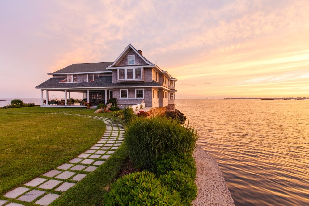 A house next to a body of water