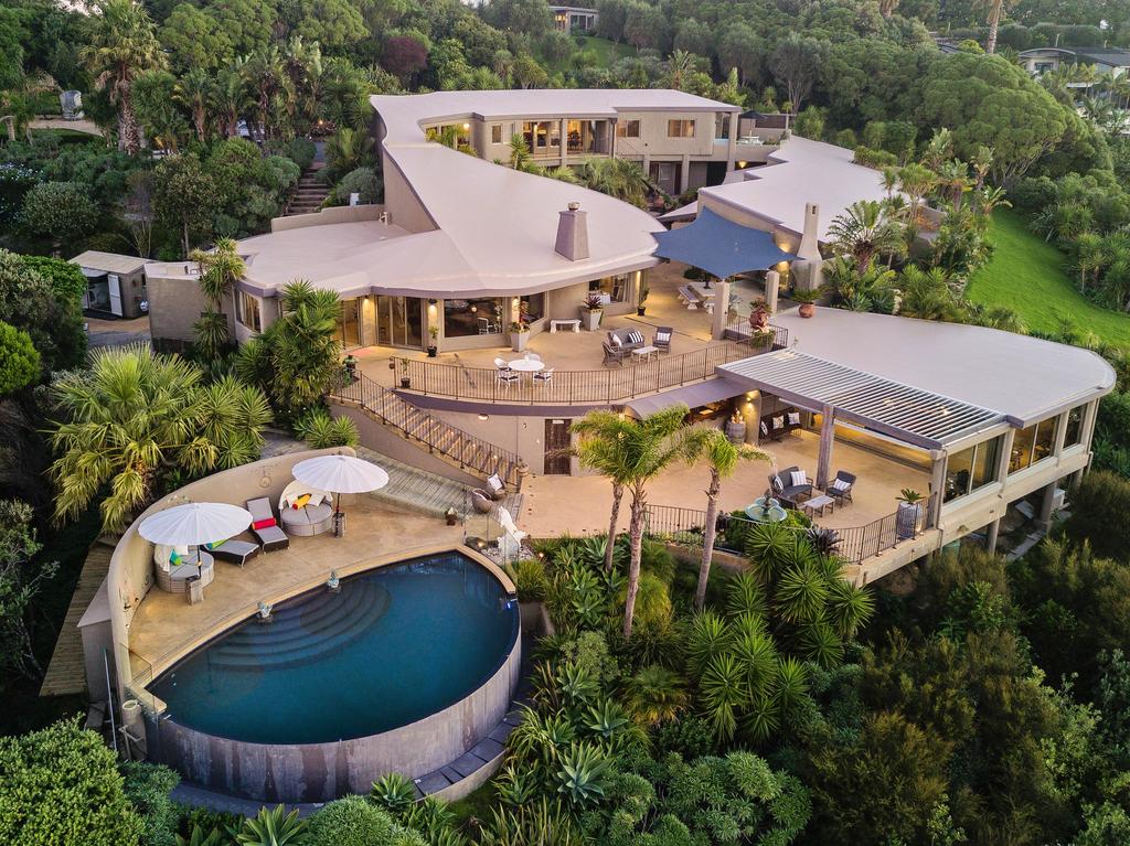 A house with trees in the background