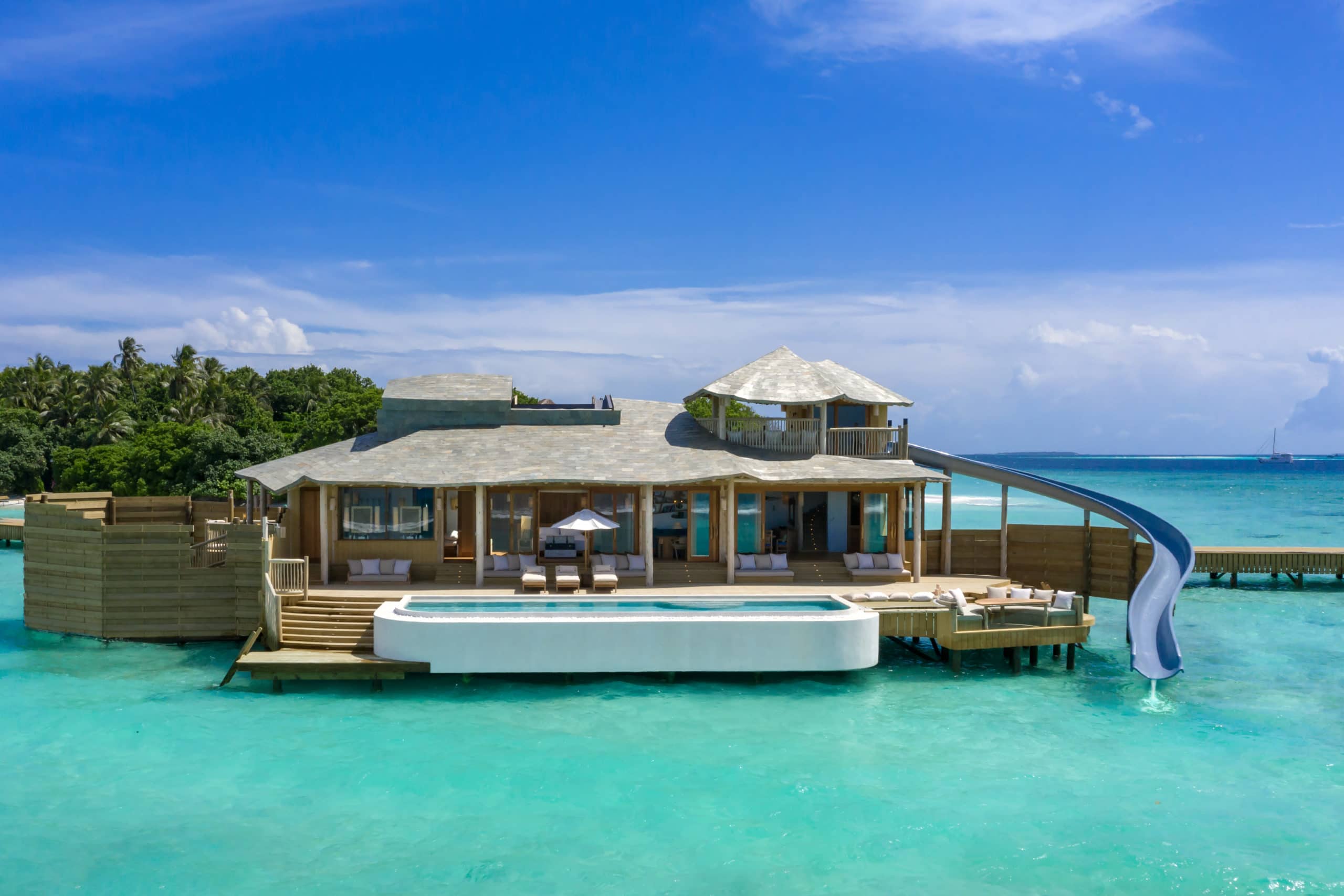 Soneva Fushi Resort Has Overwater Villas With A Built-In Water Slide