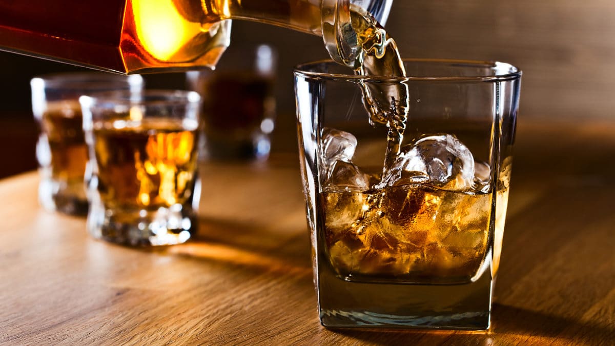 A glass cup on a wooden table