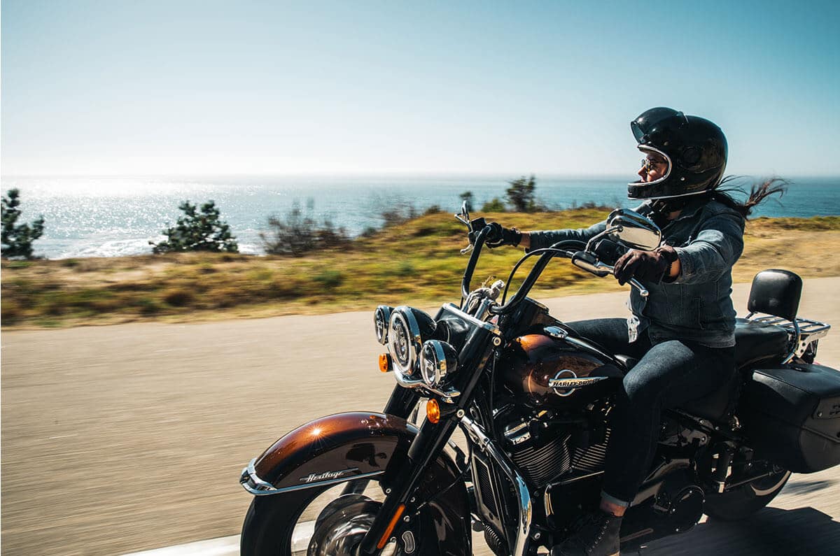 A man riding on the back of a motorcycle