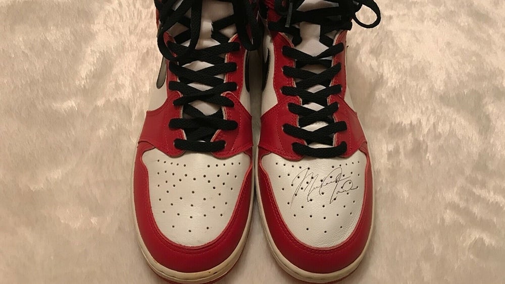 Air Jordan 1s on eBay signed.