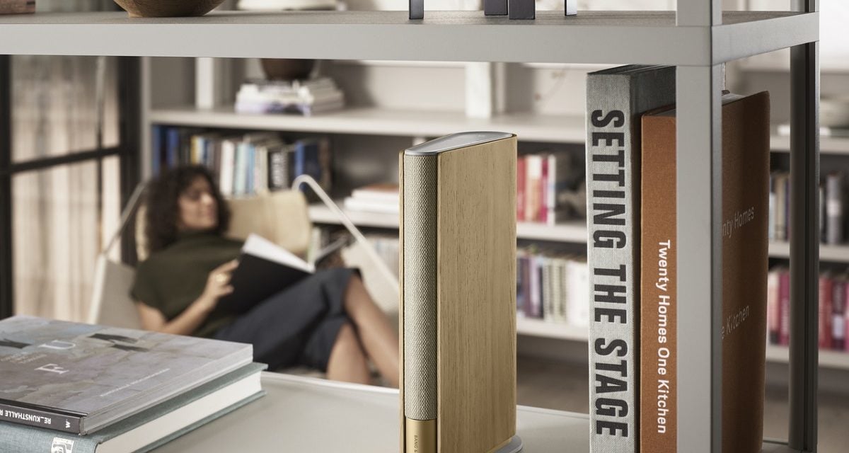 Beosound Emerge sitting on a bookshelf