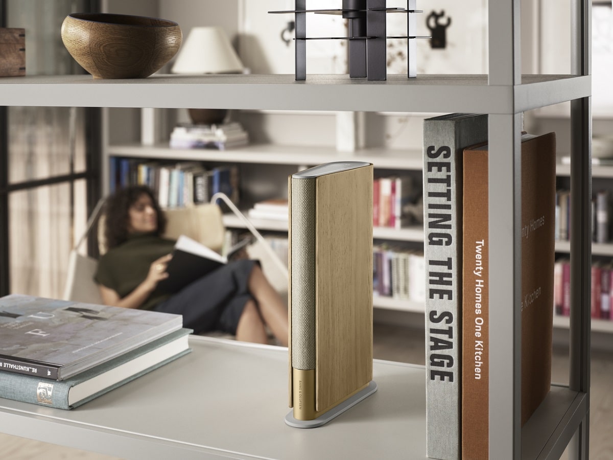 Beosound Emerge sitting on a bookshelf