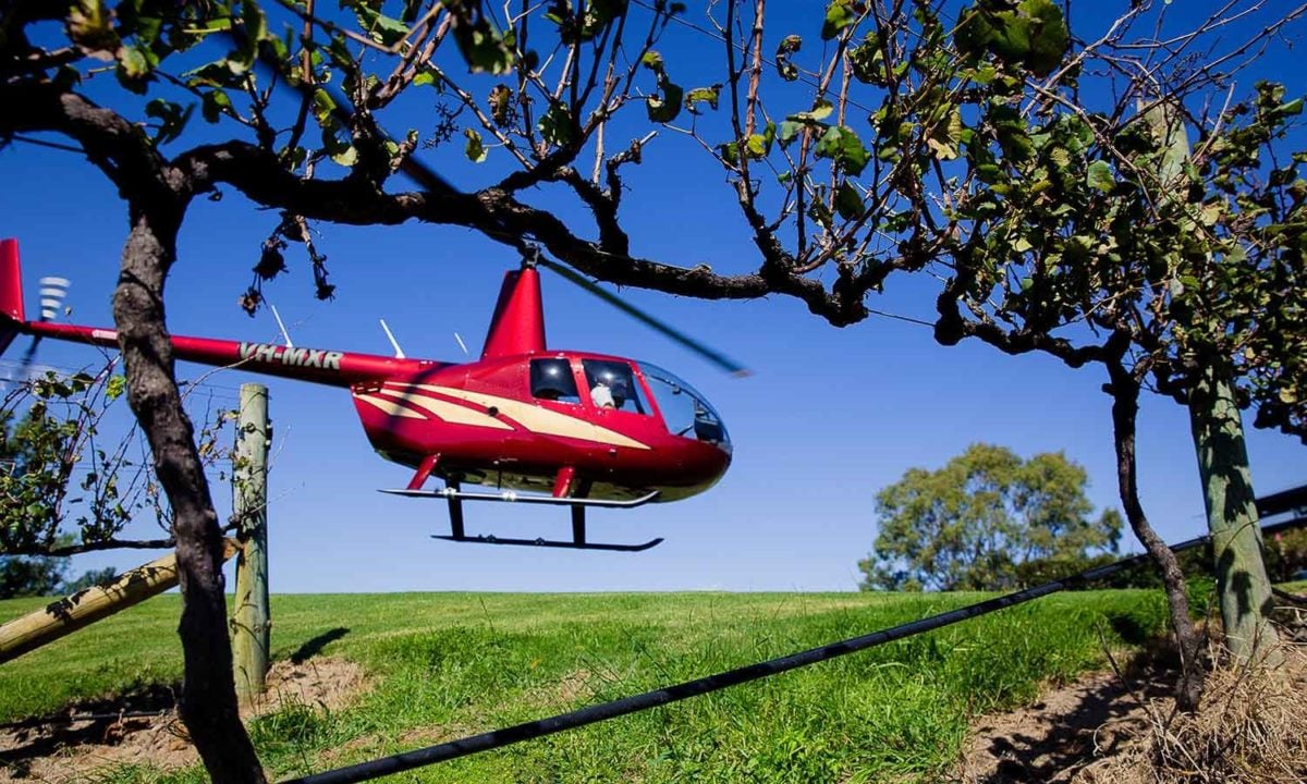 A helicopter flies on its way to pub Brisbane's best pubs.