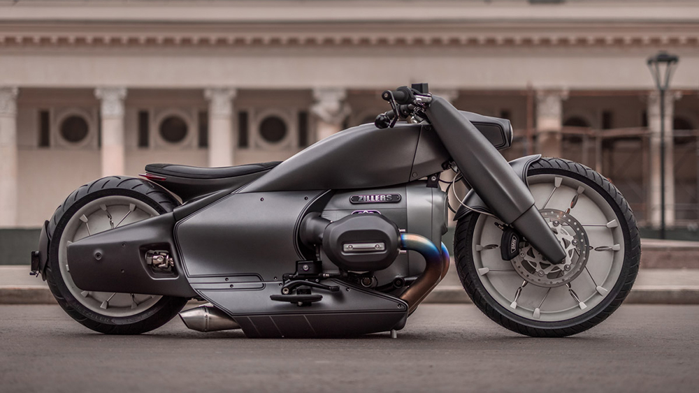 A motorcycle parked on the side of a building