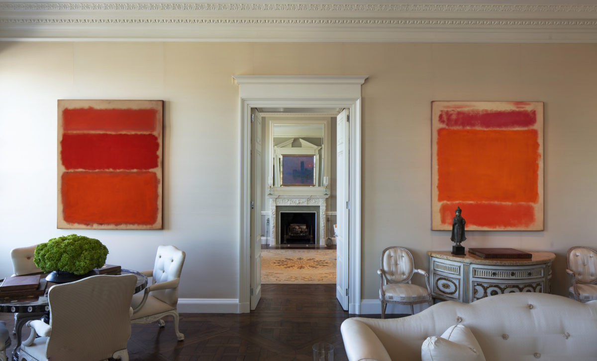 A living room filled with furniture and a fire place
