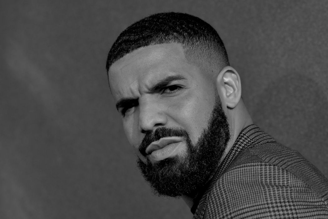 Drake is the master of the high fade blended with a buzz cut to make sure he has a signature look.