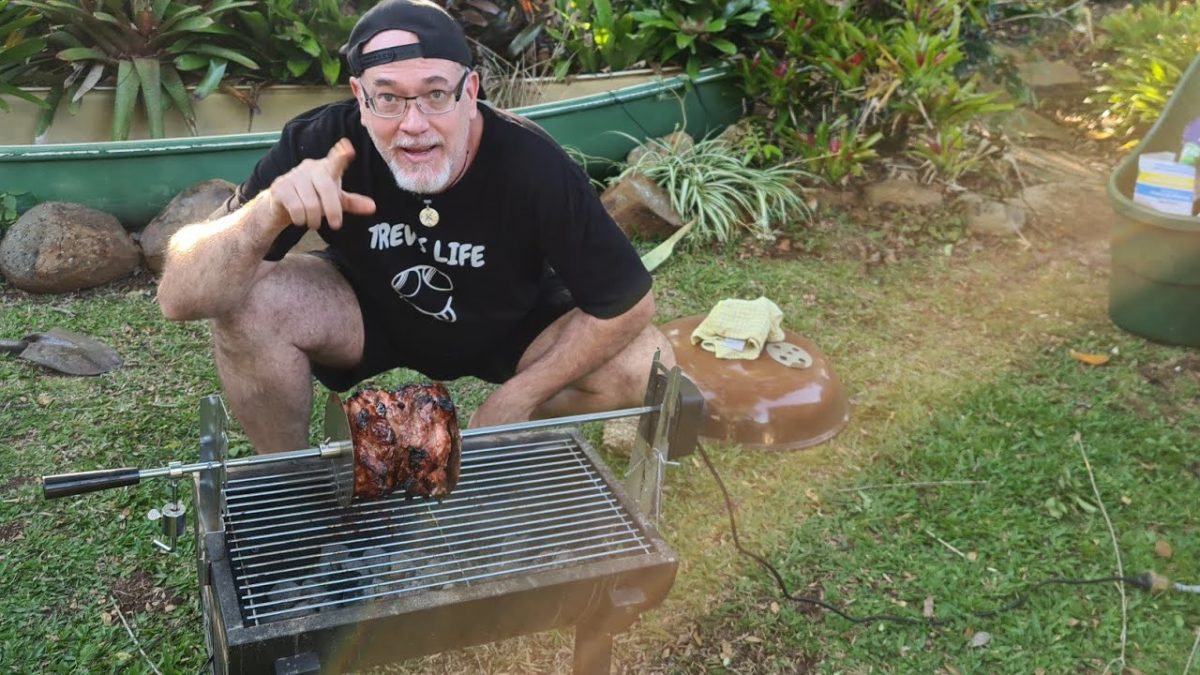 Jumbuck make a very entry-level Hibachi Grill with an electric powered rotisserie shaft.