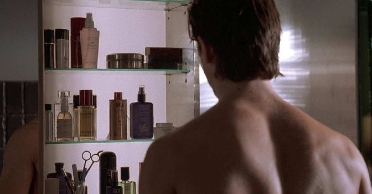 American Psycho scene where Patrick Bateman is looking at skincare and perfume