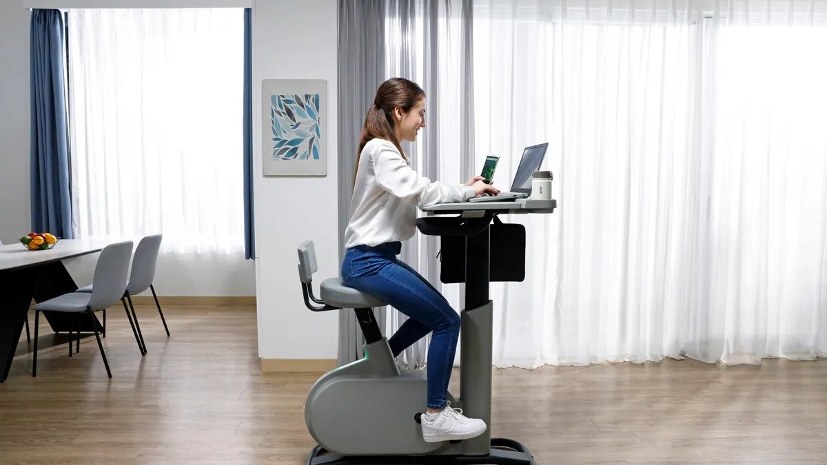 This Acer Working Desk Uses Kinetic Energy To Charge Your Devices While You Pedal
