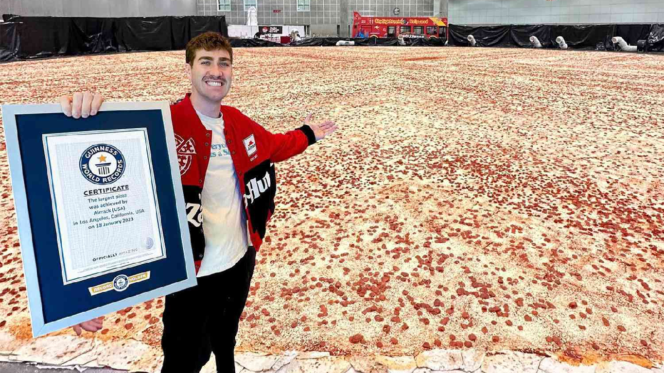 Pizza hut sets guinness world record with insane 68 000 slice pepperoni